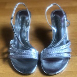 The Touch Of Nina Silver Heels